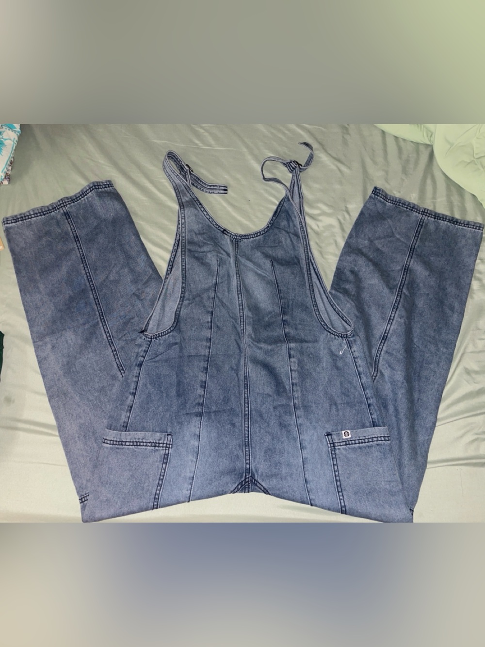 Classic Light Blue Denim Women’s Overalls with Adjustable Shoulder Ties
